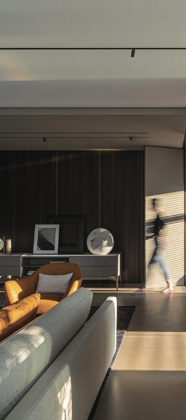 Architectural corridor with recessed circular ceiling light - Lytronex Dubai